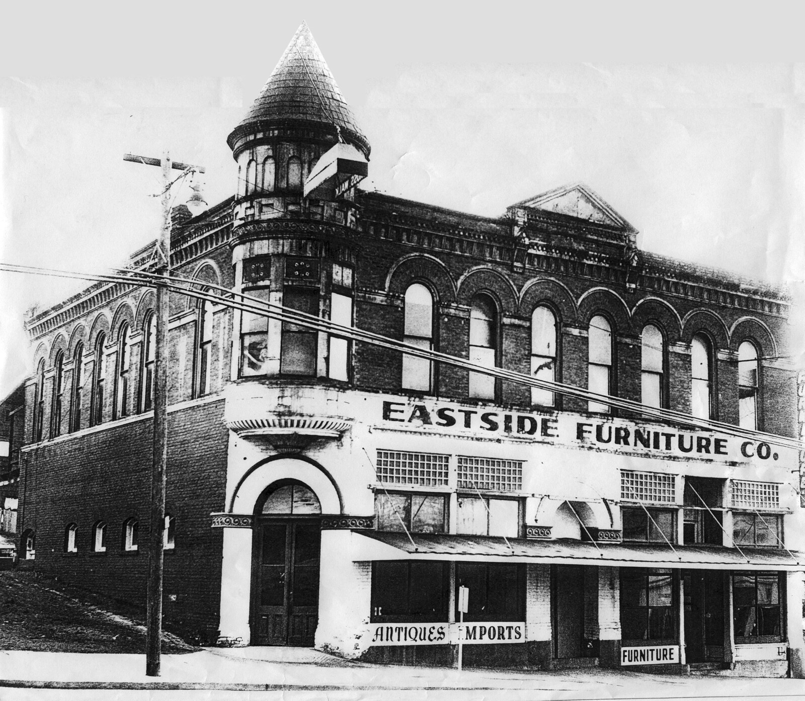 Historic Peter Kirk Building with Eastside Furniture Company sign